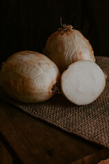 Onions on a wooden background