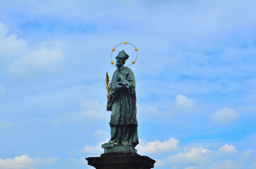 Statue of Saint John of Nepomuk on Charles Bridge in Prague, Czechia