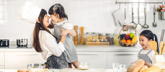 Portrait of enjoy happy love asian family mother and little toddler asian girl daughter child...