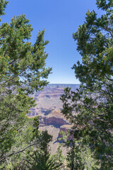 Clear skies and The Grand Canyon. that is a huge valley cut by the Colorado River.