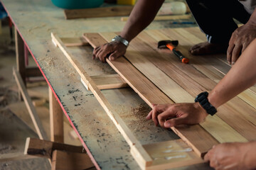 Carpenter build furniture at wood factory for sale