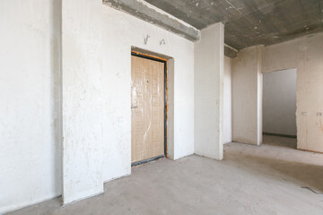 interior of the apartment without decoration in gray colors. rough finish