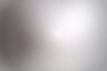 Light shining on gray silver foil glitter metallic wall with copy space, abstract texture background