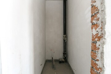 interior of the apartment without decoration in gray colors. rough finish