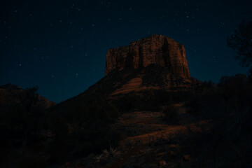 night scene of hills and trees and pretty lighting