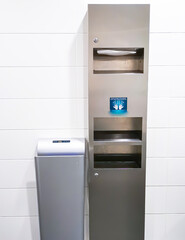 Electric hand dryer - blower style or Paper towel dispenser on white background, healthcare concept 