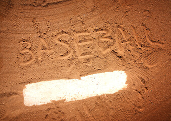 pitchers mound on field with baseball written in dirt