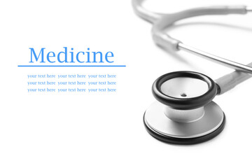 Stethoscope on white background. Space for text