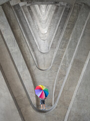 man amd son with his colourful umbrella