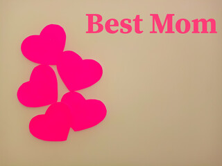 Mother's day Holiday Concept. Festive background with the inscription Best Mom. Top view.