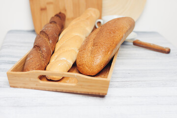 fresh loaf bread bins on the table kitchen food ration breakfast