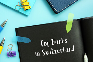  Financial concept about Top Banks in Switzerland with sign on the sheet.