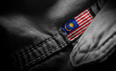 Tag on dark clothing in the form of the flag of the Malaysia