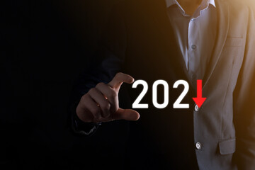 Plan business negative growth in year 2021 concept. Businessman plan and increase of negative indicators in his business, decline down business concepts.