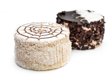 Two round small cakes on white.