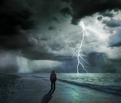 silhouette of a man and stormy sea, concept of uncertainty and obscurity of future
