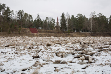 City Ogre, Latvia.Ice flows along the river.Travel photo.
