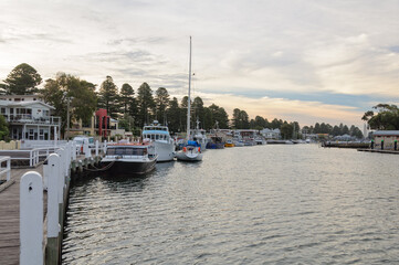 Fototapeta na wymiar Boats moored on the Moyne River - Port Fairy, Victoria, Australia