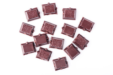 Broken dark chocolate broken stack isolated on white background