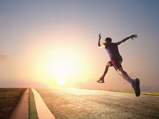Fototapeta premium a man as athlete runner in high speed running action on the road