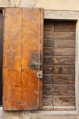 Old medieval entrance door. Tuscany, Italy