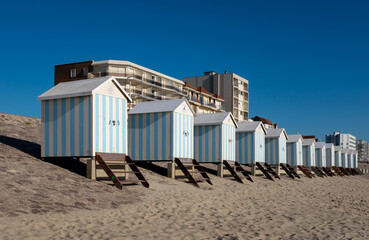 Striped beach cabins in Hardelot, France.