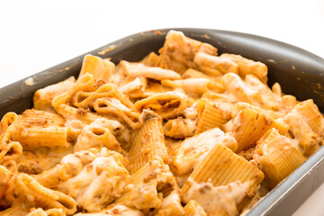 Macaroni with meat baked with cheese