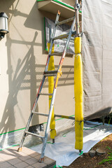 外壁塗装。梯子、メッシュ
シート。施工。