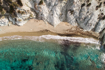 Top view aerial image from drone of an stunning beautiful sea landscape beach with turquoise water. Beautiful Sand beach with turquoise water,aerial drone shot. 'Foca' Izmir Turkey