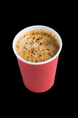 Coffee to go in a paper cup without a lid on a black background copy space top and side view