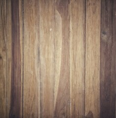 Dark brown old wood texture pattern of the exterior wall cladding.  Vintage style vignette  Use it as wallpaper and background.