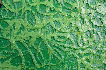 close - up of the surface with smears of oil paint. The basis for the design. Interesting texture.