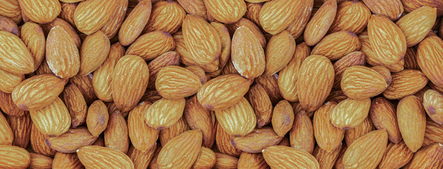 almonds walnut peeled light brown background natural products