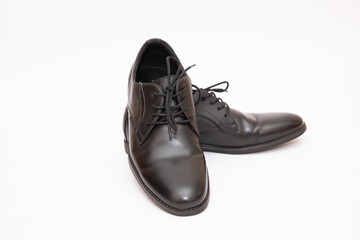 Mens black shoes on a white background