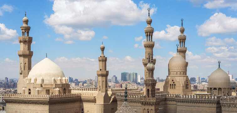 Aerial day shot of minarets and domes of Sultan Hasan mosque and Al Rifai Mosque, Old Cairo, Egypt