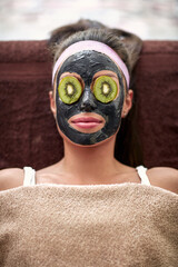 Woman with black mask on face