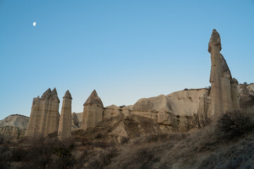 Cappadocia's major tourist attraction Beautiful sunrise morning at love valley. Cappadocia (Kapadokya) is known as one of the best places to fly with hot air balloons worldwide. Goreme, Turkey.