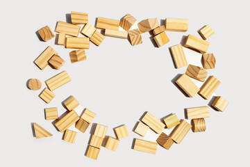 Wooden building blocks on white background.
