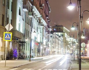 Moscow, Russia, Mar 4,2021:  Night view of Pyatnitskaya street. Lanterns, illumination, car traces