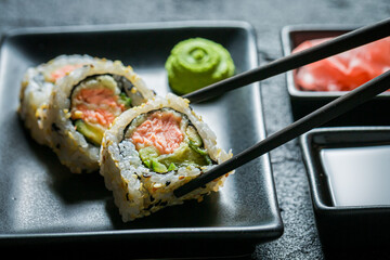 Delicious sushi with wasabi and soy sauce. Traditional Japanese cuisine.
