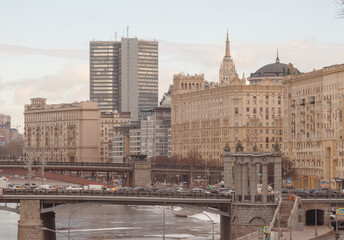 Obraz premium Moscow, Russia. Winter view of Smolenskaya embankment, Moscow city hall, bridges. Shot at telephoto lens