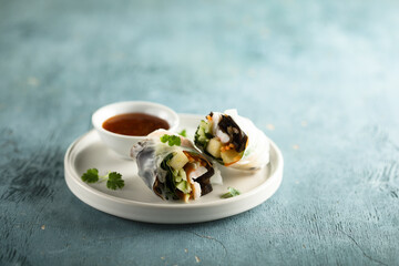 Traditional homemade fresh rolls with mango and crab