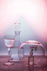 Still life with glass objects on a multicolored background. For interior printing. For the poster