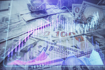 Multi exposure of forex chart drawing over us dollars bill background. Concept of financial success markets.