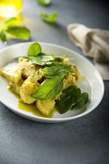 Potato salad with spinach and pesto sauce
