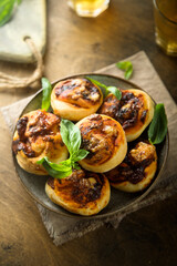 Homemade cheese swirls with pesto sauce