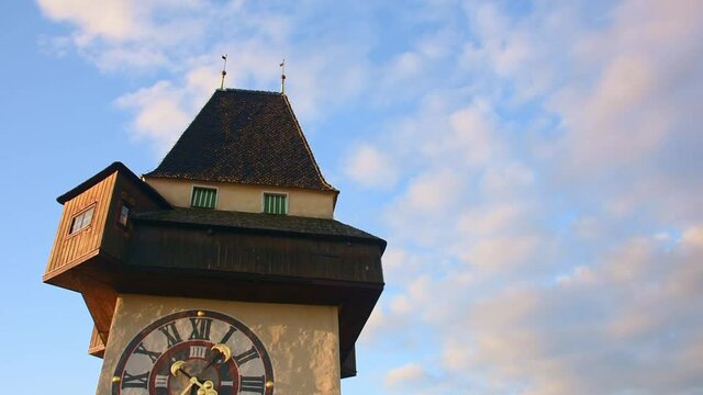 The famous clock tower on Schlossberg hill, one of the city of Graz attractions, Styria region, Austria, in the morning