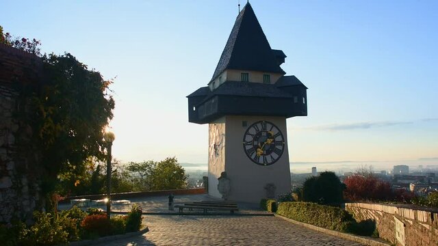 The famous clock tower on Schlossberg hill, one of the city of Graz attractions, Styria region, Austria, in the morning