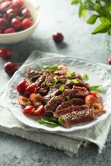 Beef steak with cherry salsa