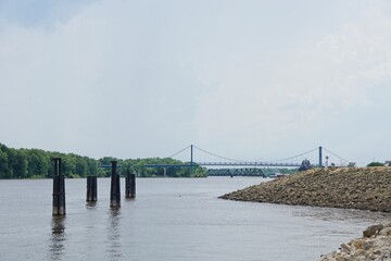Bridge over river MIssissippi connecting Clinton IA and Fulton IL - obrazy, fototapety, plakaty
